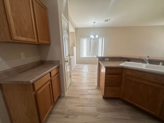 Building Photo - SAN TAN RANCH SINGLE LEVEL 4 BEDROOM WITH NEW FLOORING THROUGHOUT