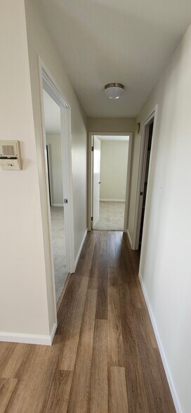 Hallway to bedrooms and bathroom - 5208 Belclare Rd