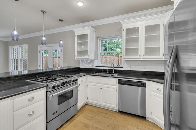 Kitchen overlooks private deck. - 153B Woodmont Blvd