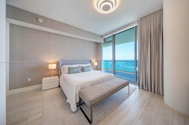 Building Photo - 10203 Collins Ave