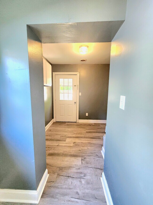 dining room entry to laundry room - 321 Stonewall Ave S