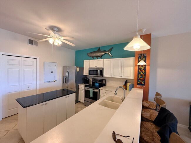 Building Photo - Waterfront Condo 3/2/1 - FULLY FURNISHED! - (Available annually or monthly)