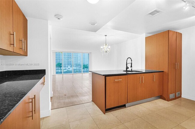 Building Photo - 10275 Collins Ave