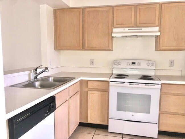 Building Photo - Nice 2X2 located on 2nd floor- Tile & laminate flooring! NO CARPET! Call today!! Tranquil water v...