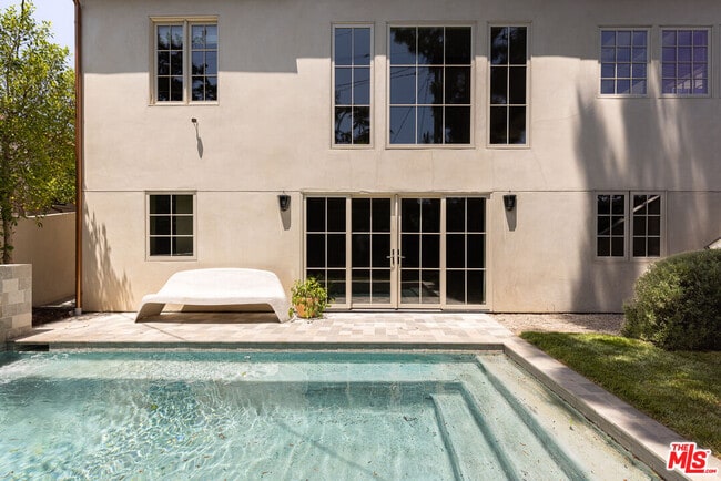 Building Photo - 4228 Los Nietos Dr