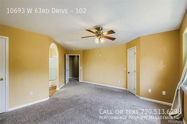 Building Photo - 10693 W 63rd Dr