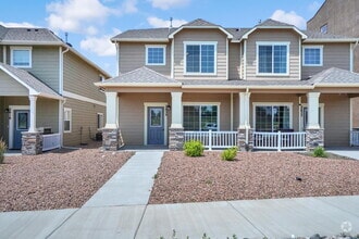 Building Photo - Modern Townhome with Central A/C, 2-Car Ga...