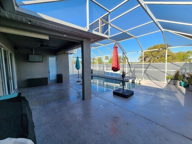 Building Photo - Beautiful Port Orange 4 Bedroom 2 Bathroom Pool Home