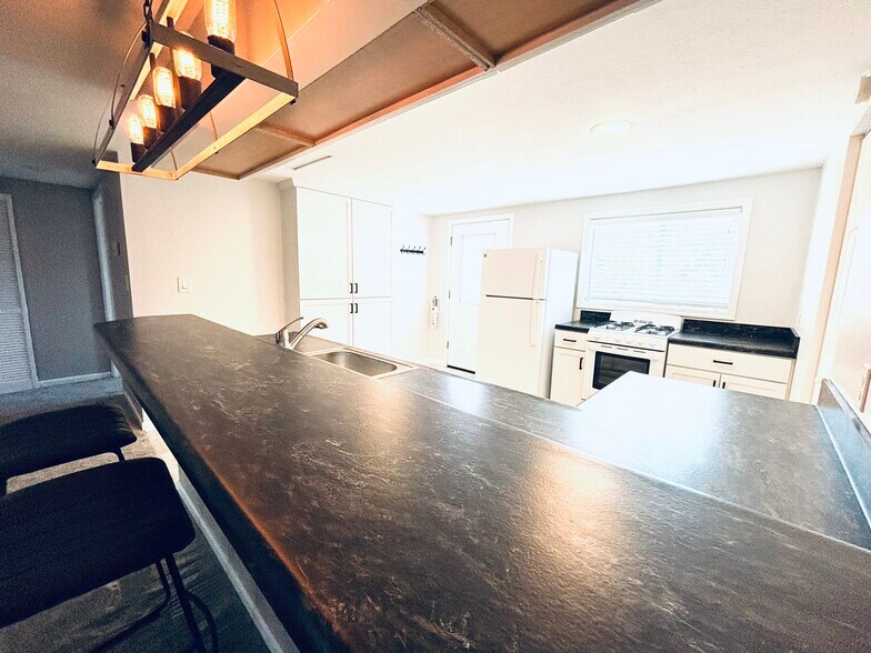 Breakfast bar view into kitchen - 9841 Cleveland Ave NW
