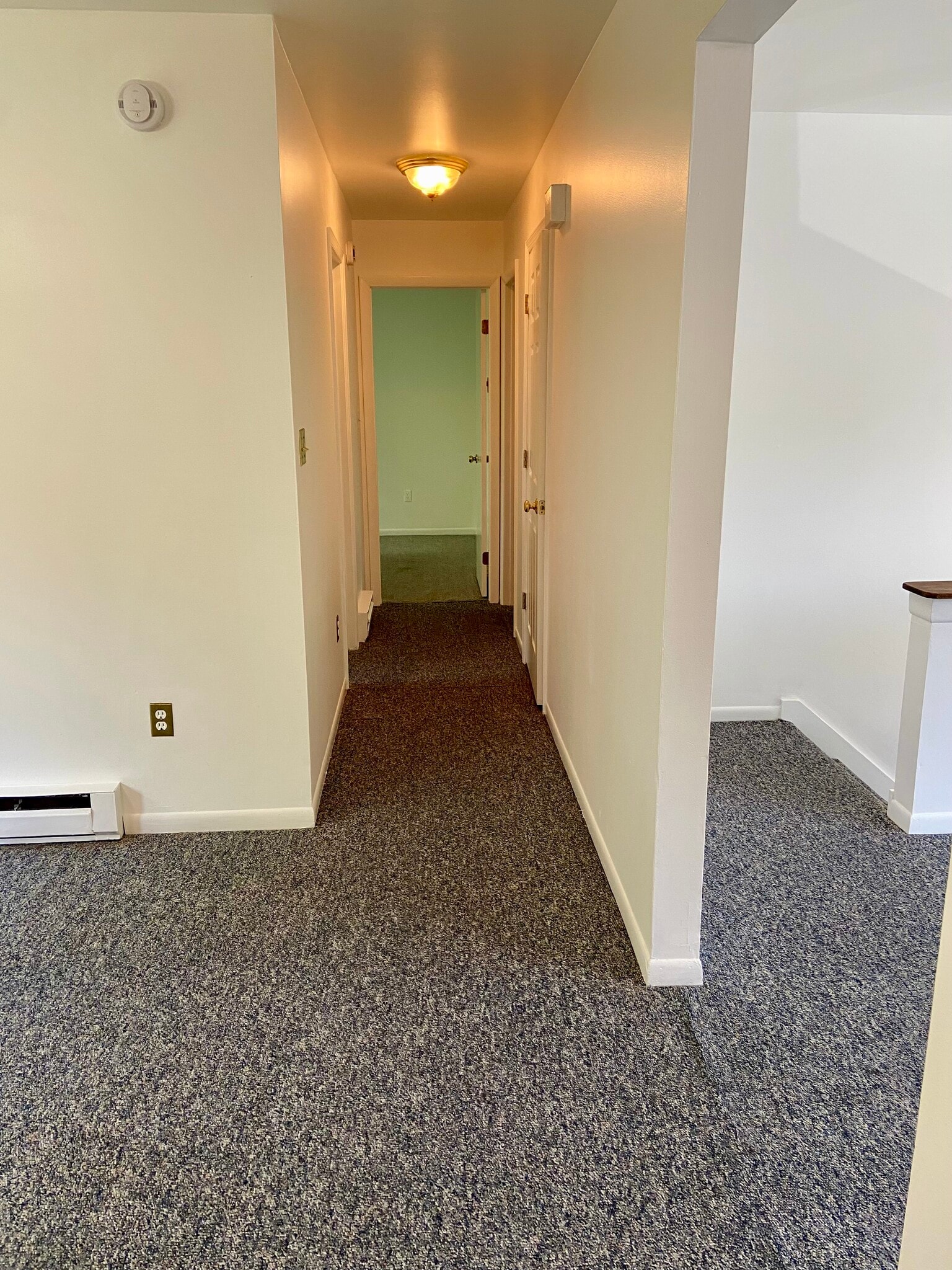 Hallway to bathroom, bedrooms, and laundry - 2710 S 2nd St
