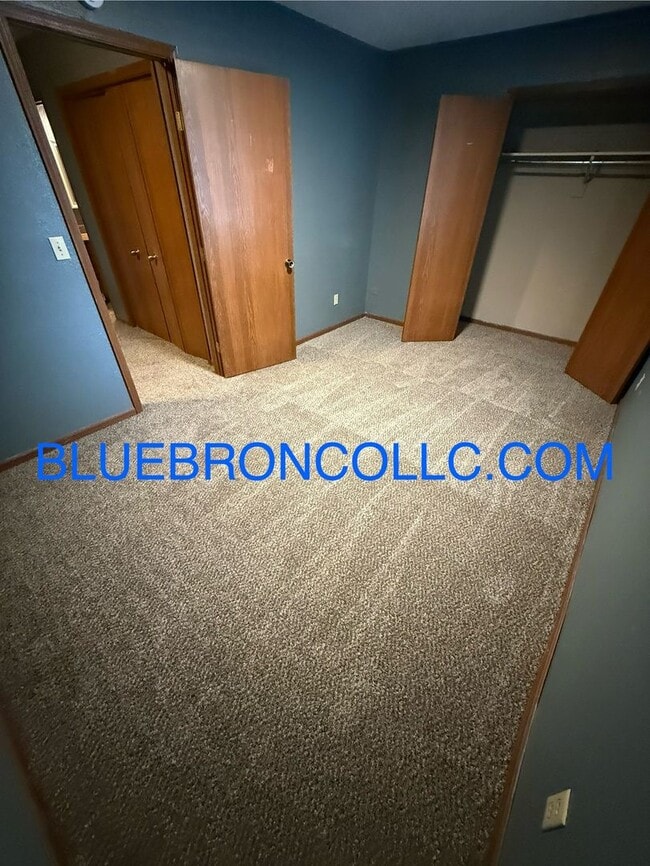 Building Photo - New flooring and fresh paint in this spaci...