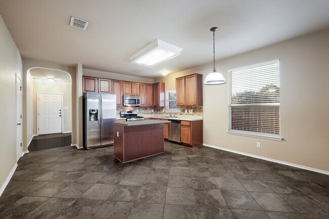 Building Photo - Charming Home with Covered Patio & Two Living Areas