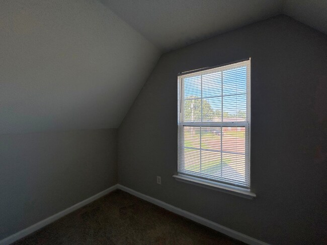 Building Photo - Spacious 4BR/2BA Olive Branch Home | 1,965 Sq Ft, Modern Fireplace, Bay Window & 2-Car Garage