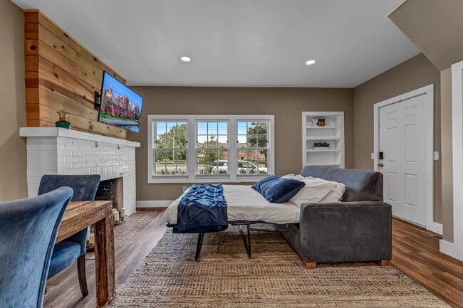 Building Photo - Furnished 1-Bedroom Lower Apartment on Main St