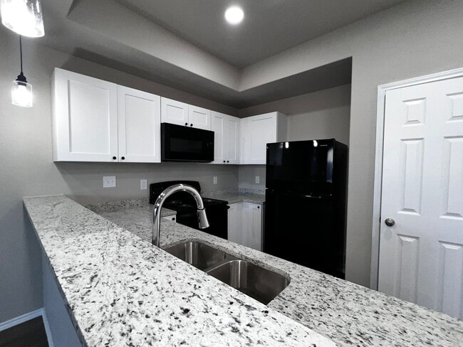 Building Photo - Modern 3BR Townhome w/ Garage, Private Yard & No Carpet – Built 2022