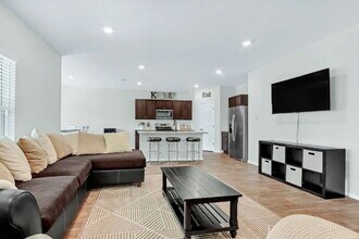 Building Photo - "Charming 4-Bedroom Retreat with Spacious ...