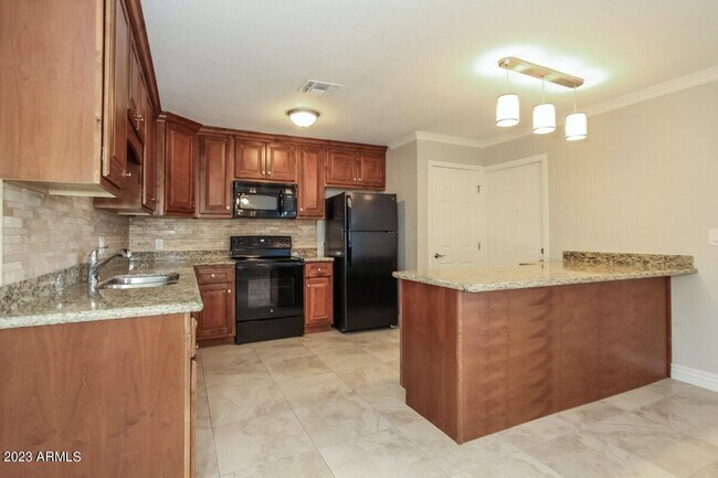 Building Photo - 9601 N 55th Dr
