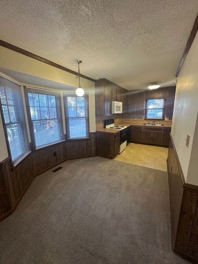 Building Photo - One Month Rent Free! Dual Primary Bedrooms...