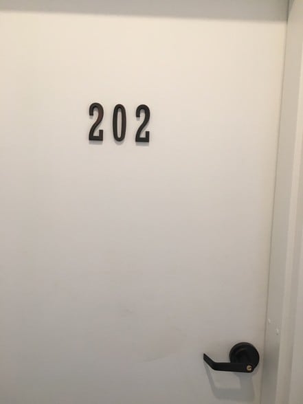 outside door leading to apartment unit - 511 Toulouse St