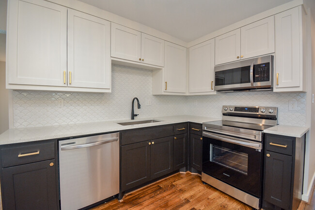 Hand-built cabinets and stainless appliances - 2916 Arbor St