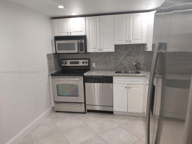 Building Photo - 5701 Collins Ave