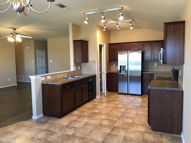 Open kitchen w/ NEW ref. - 6524 Cold Water Dr