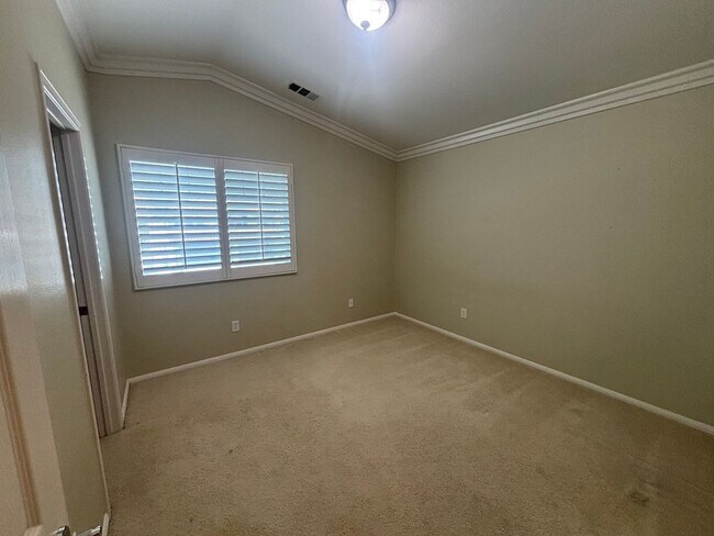 Building Photo - Spacious 4-Bedroom Home with Community Ame...