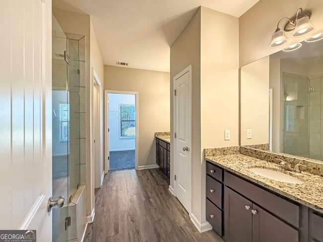 Building Photo - 6369 Woodland Station Dr