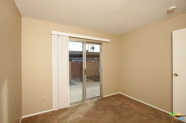 Building Photo - Spacious 4-Bedroom Condo in Indian Canyon ...
