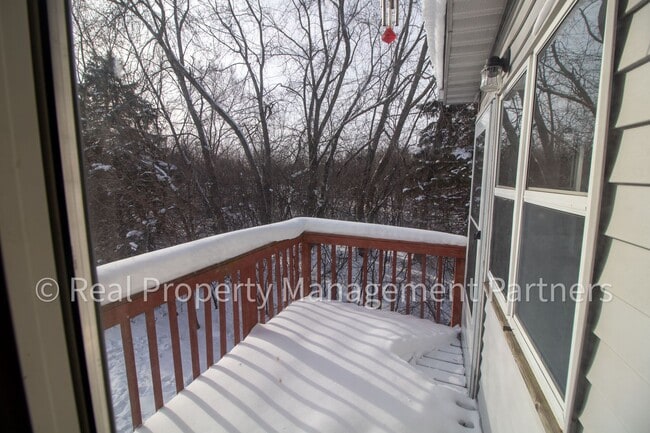 Building Photo - 2-Bed, 1-Bath Upper Unit with Garage & Porch – Steps from Paul Henry Trail