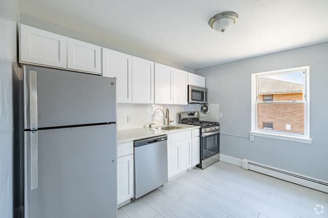 Kitchen - Station Square Apartments – Modern Living with Parking Included