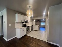 Building Photo - 4 Bedroom/2 Bathroom with 2 Living Rooms!
