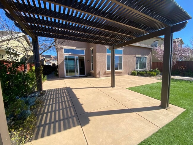 Building Photo - Advent -Immaculate Four Bedroom Home W/ Tw...