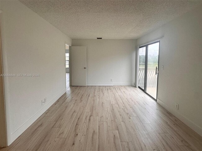 Building Photo - 2580 Coral Springs Dr
