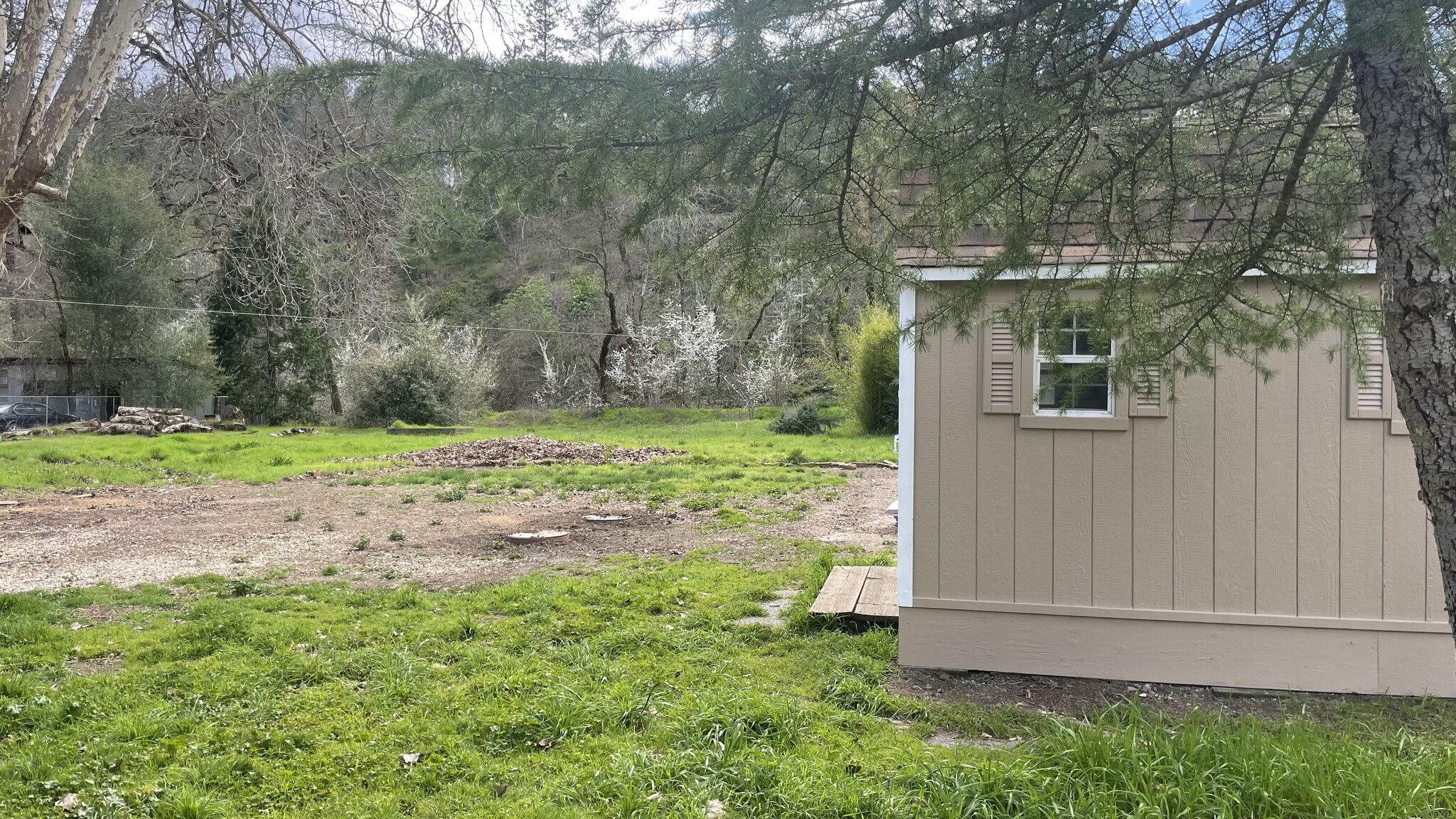 View of tenant's shed and backyard. - 3289 CA-128