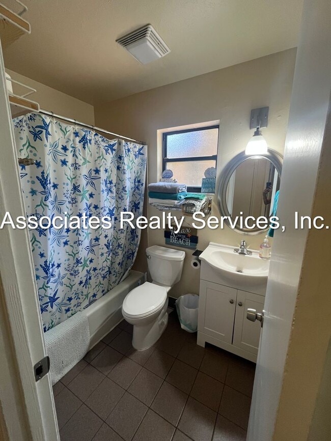 Building Photo - Beautifully furnished  2-Bedroom Duplex – ...