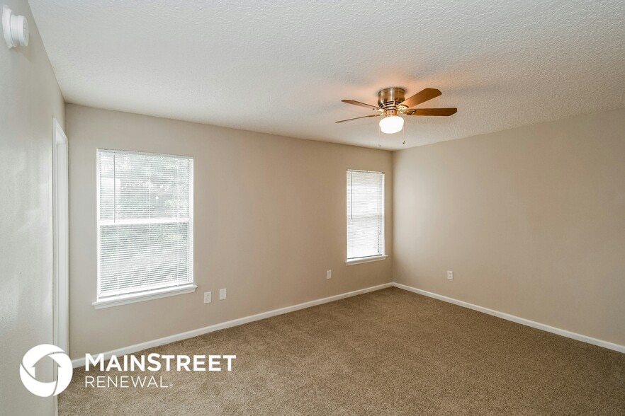 Building Photo - 9370 Jayhawk Ln