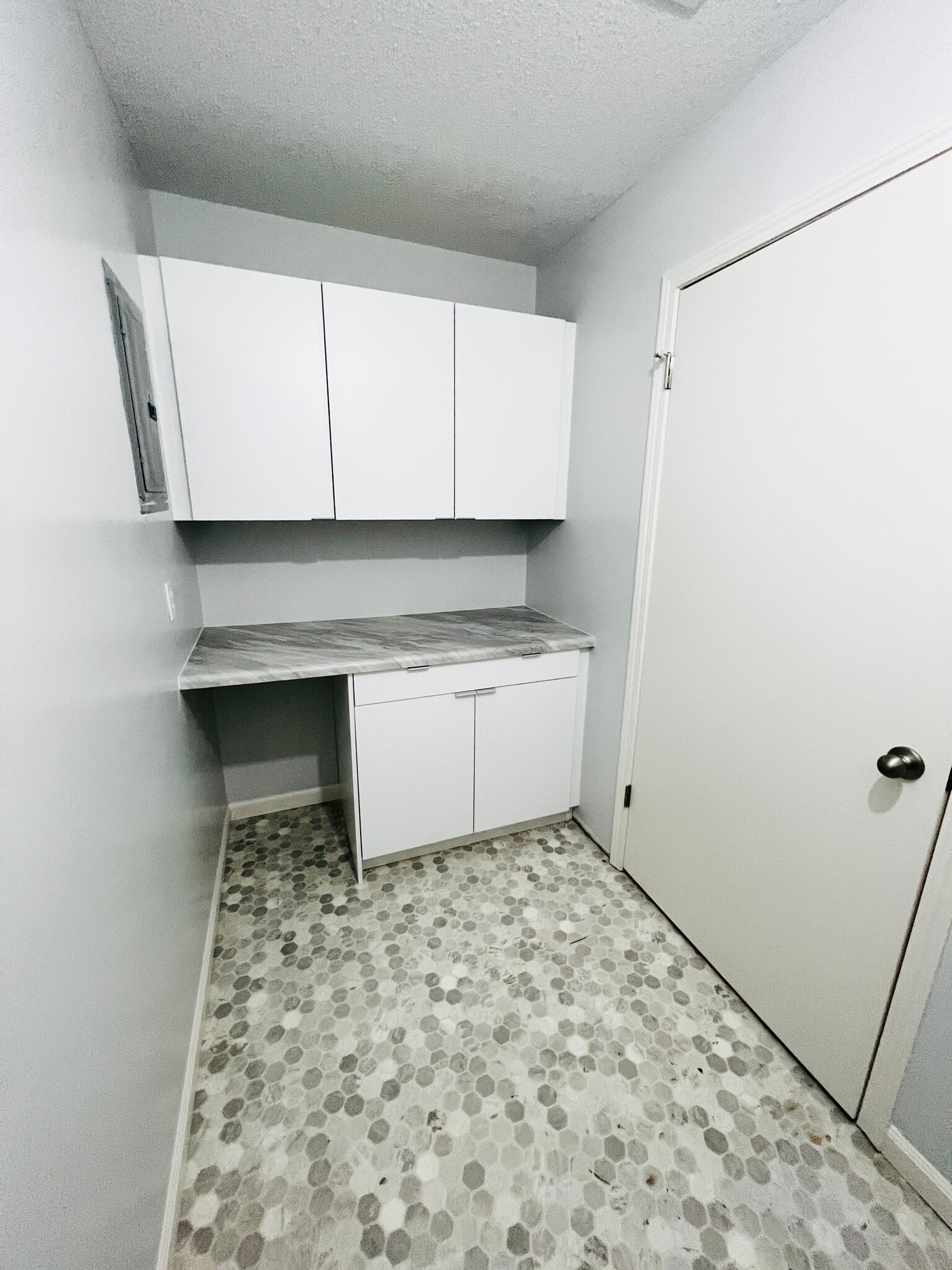 Laundry room storage - 1316 E 25th Ter