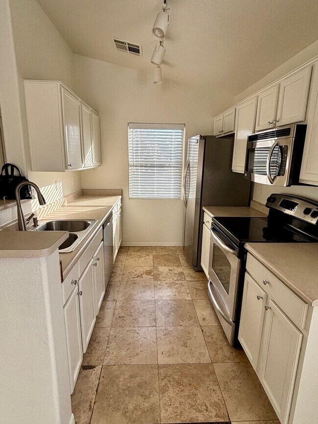 Building Photo - Adorable single story, corner lot home with 3 bedrooms, 2 bathroom and 2 car garage with a huge b...