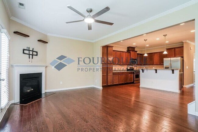Building Photo - End Unit Townhome | Back Patio With Privac...