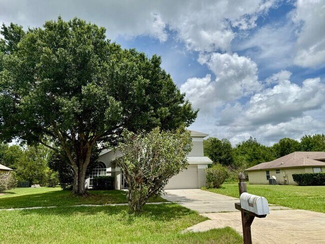 Building Photo - LARGE AND SPACIOUS 4/3 HOME IN EAST ORLANDO WEDGEFIED COMMUNITY