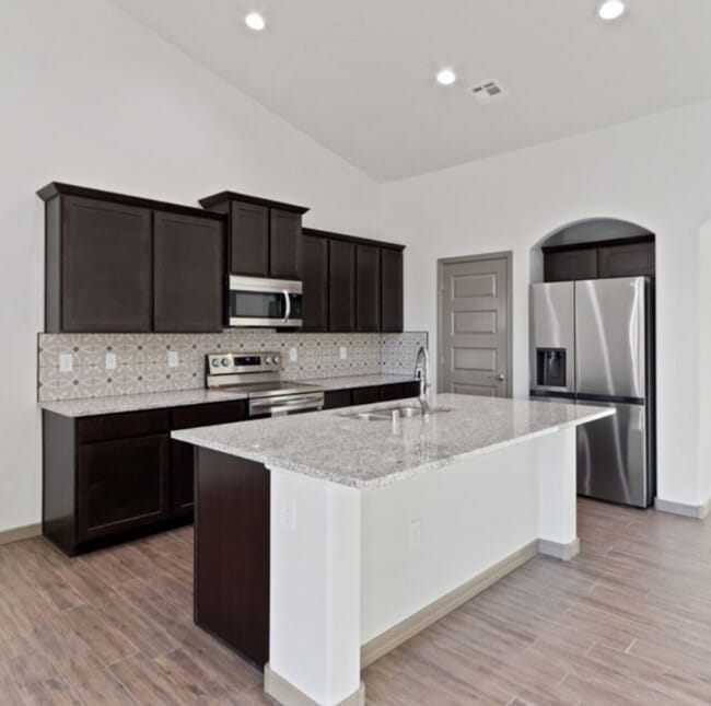 Building Photo - Brand New Townhome, $500 off first months ...