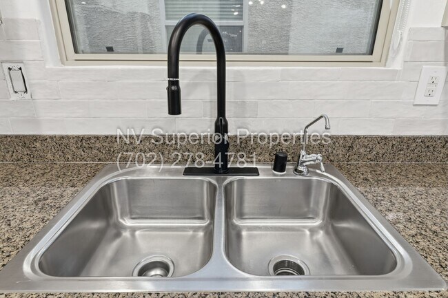 Building Photo - SW!! 2 Story 3 bedroom, 2 car garage!!! All Luxury Vinyl Plank flooring downstairs!!! Water condi...