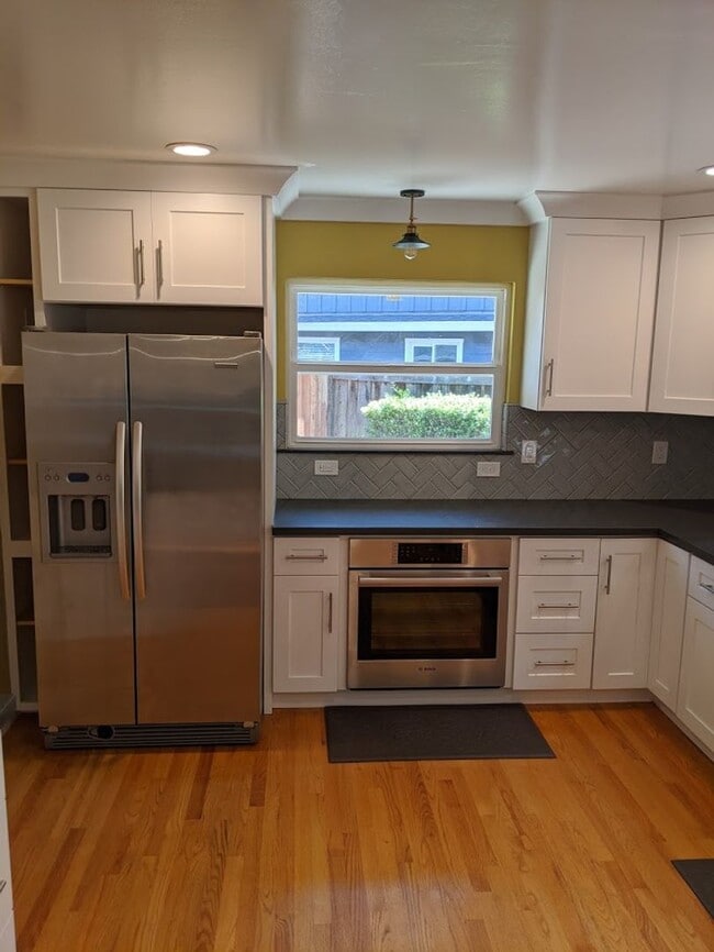 Building Photo - EMERALD HILLS - Premium updates thoughout including park like back yard