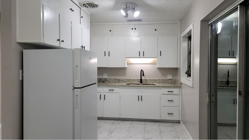 Building Photo - 7115 N Tampania Ave