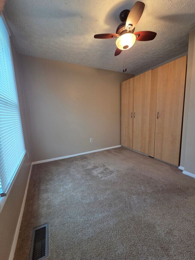 Building Photo - Serene Living in a Quiet Lakeside Community