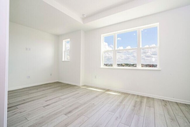 Building Photo - Modern 3-Bedroom 3.5-Bath Townhome with EV Charger, Smart Home Features, 2-Car Garage & Resort-St...