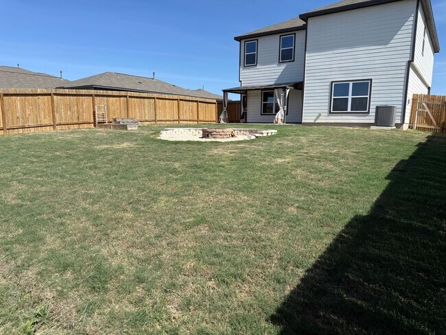 Building Photo - Move-In Ready 4BR with Private Yard & Fire Pit – Won’t Last!