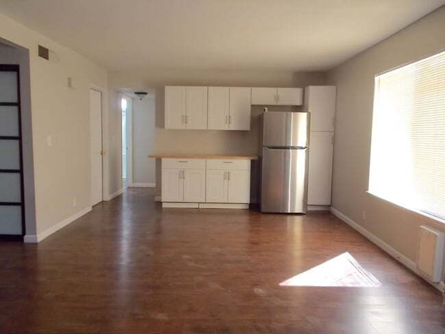 Building Photo - Spacious 4-Bedroom, 3-Bathroom Home with Open Floor Plan & Large Backyard – Prime Location!