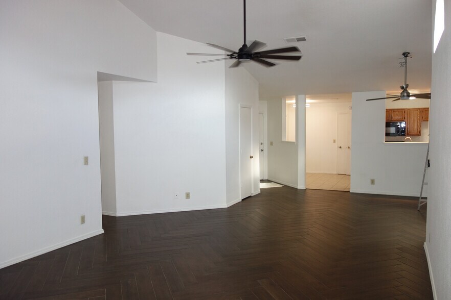 Livingroom view, hallway to bedrooms on the left - 6656 S Utica Pl